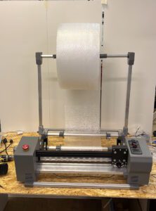 Станок для резки плёнки Cutter CX-400 с установленным рулоном плёнки
